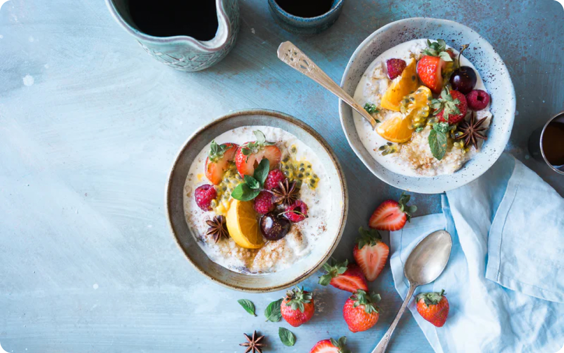 2 bowls with oatmeal and fruit